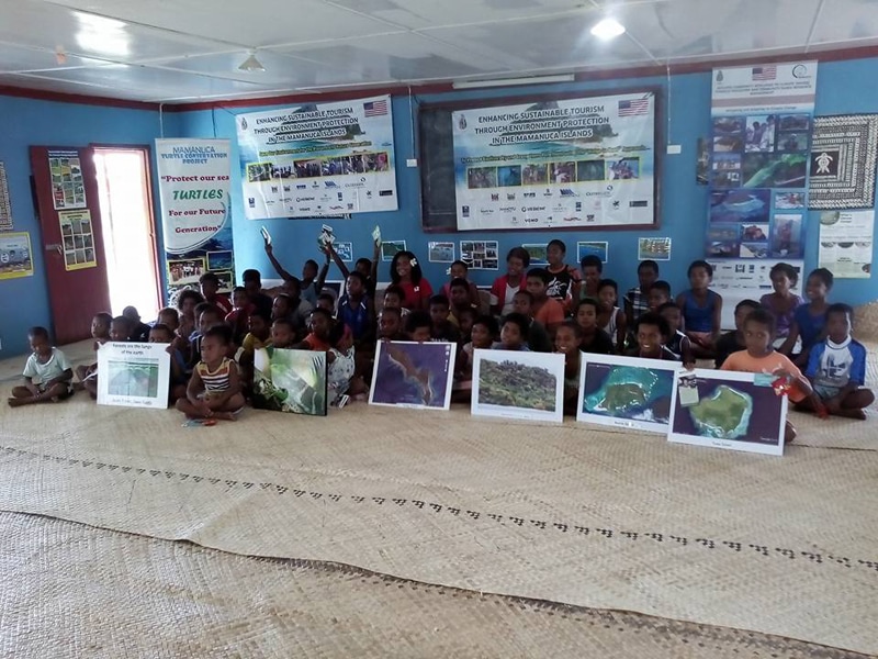 Village children learn about Maintaining Biodiversity and Healthy Ecosystems
